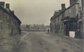 Addington Road with charity cottages to left and butchers to right